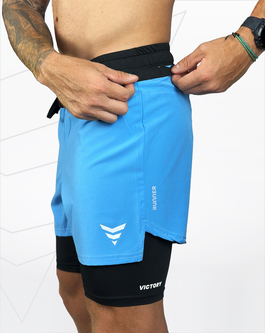 Pantaloneta running (celeste)