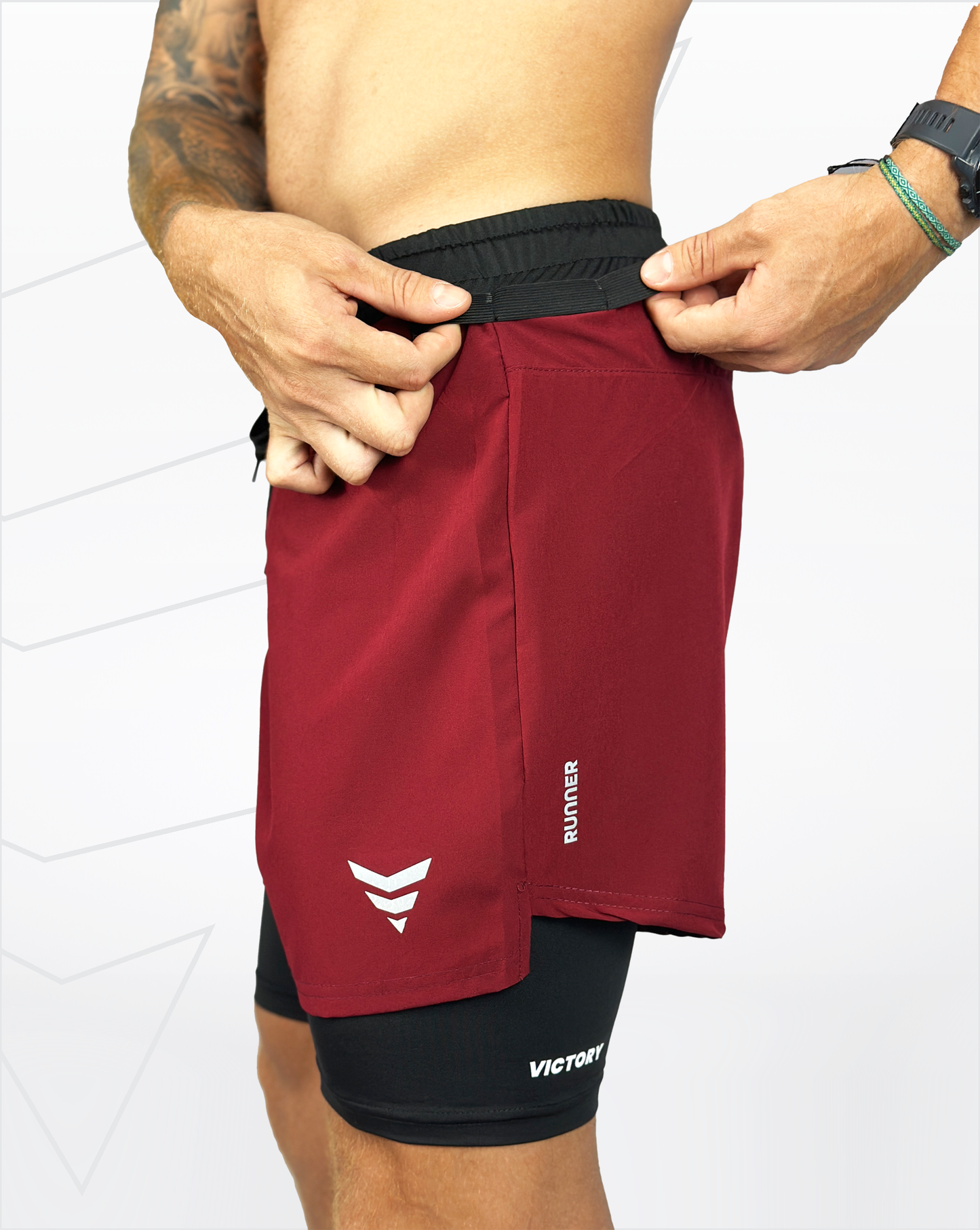 Pantaloneta running (vinotinto)