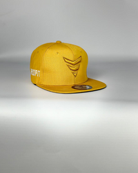 Gorra snapback (mostaza)